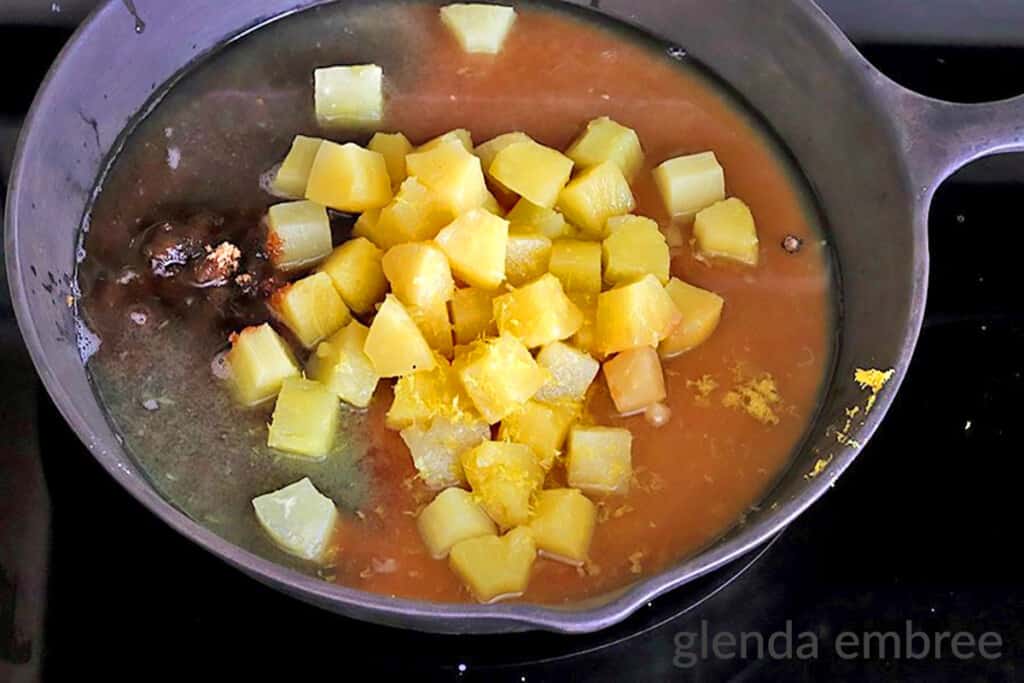 pineapple brown sugar, corn starch and lemon zest  un a cast iron skillet