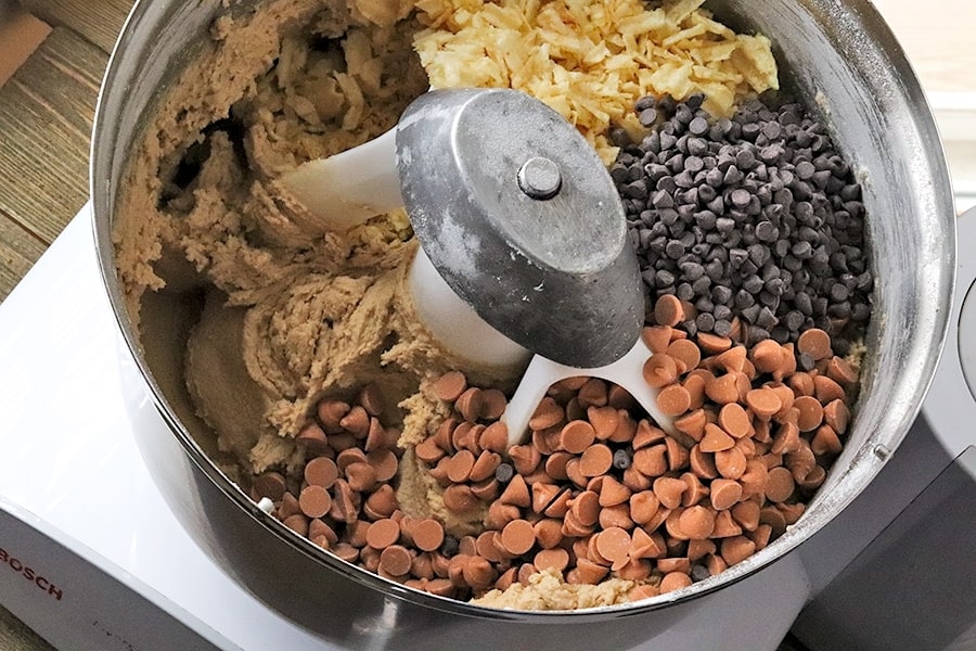 adding chips to potato chip cookie dough