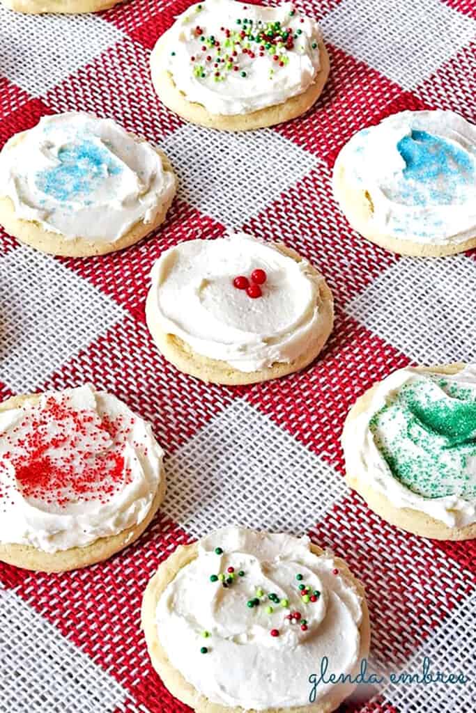 frosted drop sugar cookies on Red and white checked burlap