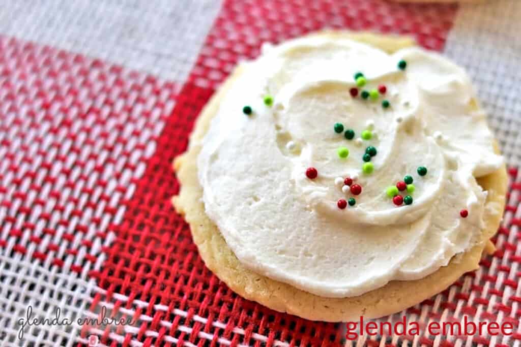 frosted drop sugar cookies on Red and white checked burlap