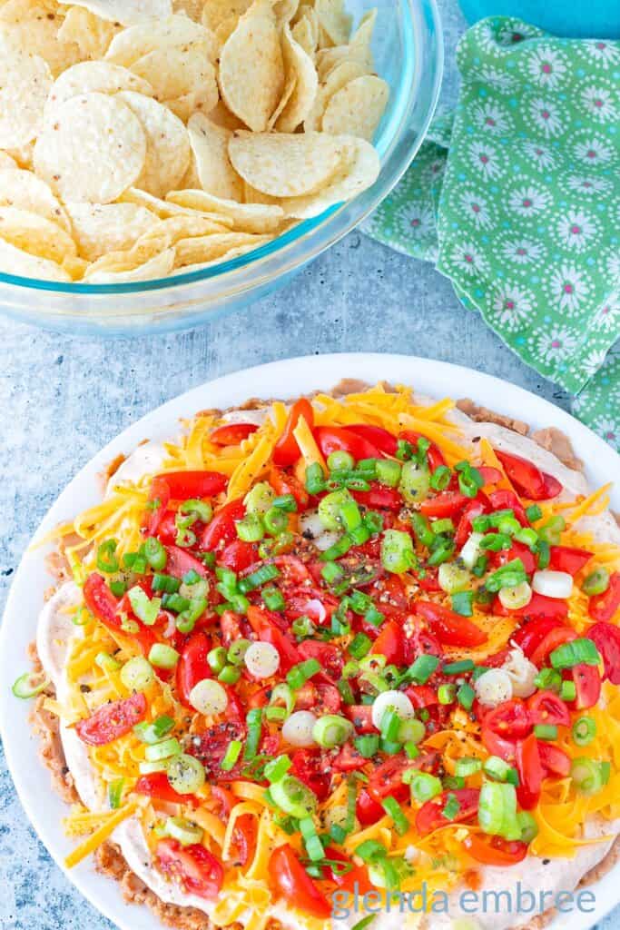 Taco dip on a white plate