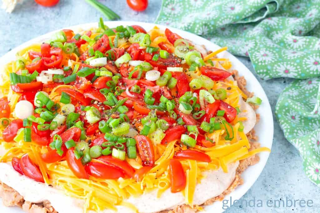 10-Minute Taco Dip on white plate.  Easy recipe.