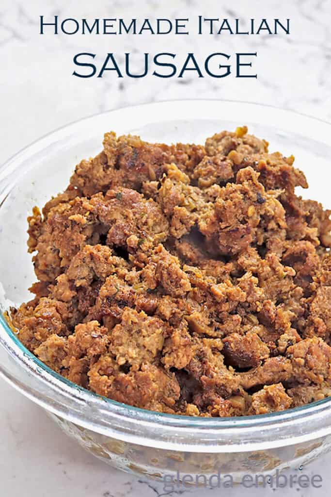 Homemade Italian Sausage crumbles in a clear glass bowl.