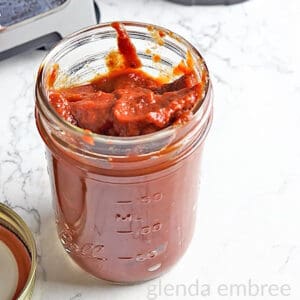 Homemade Ketchup (Best Ketchup) in a mason jar with no lid.