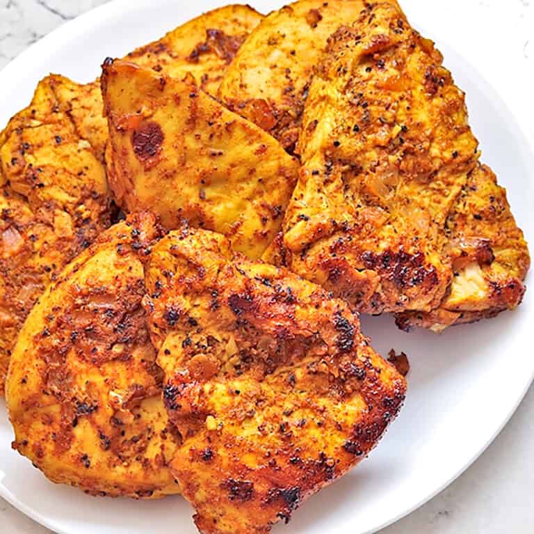 chicken shawarma on a white plate