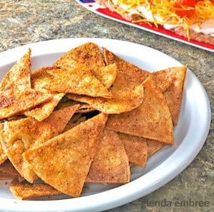 homemade taco chips in a white bowl, super bowl food ideas, super bowl snacks, super bowl snack ideas, super bowl appetizers