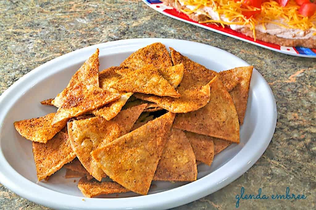 easy homemade taco chips in a white oval bowl