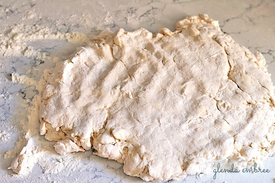 biscuit dough gathered together on counter