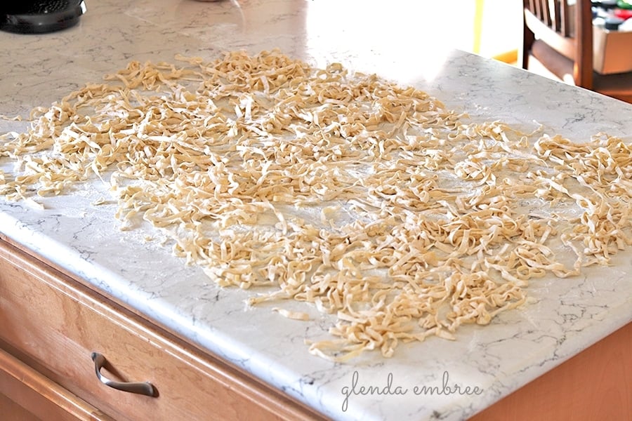 homemade pasta drying on the counter