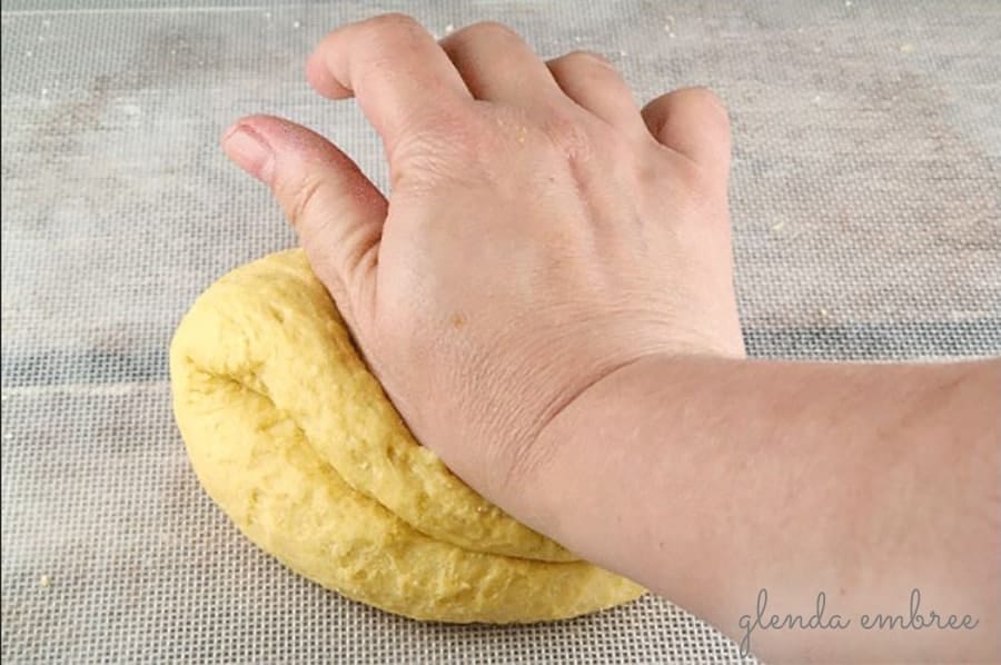 kneading homemade pasta dough