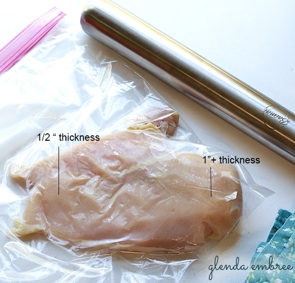 chicken breast in zip-top bag ready to be pounded to even thickness
