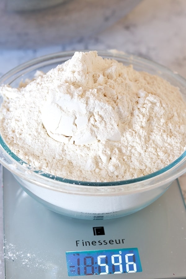 weighing flour on a kitchen scale