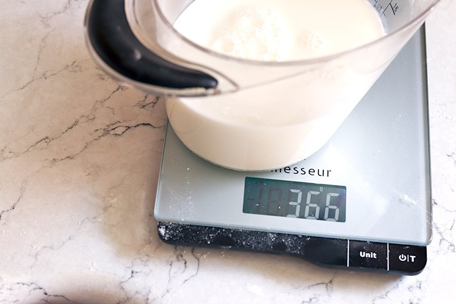 weighing whole milk