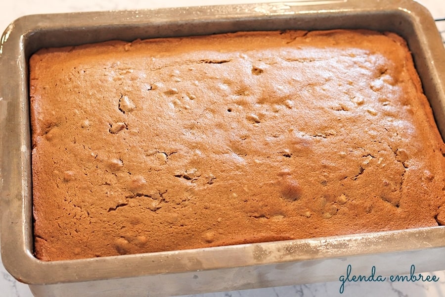 baked sour cream spice cake in a 9x13 cake pan