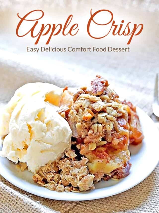 homemade apple crisp with a scoop of vanilla ice cream on a white plate. Plate is sitting on brown burlap fabric
