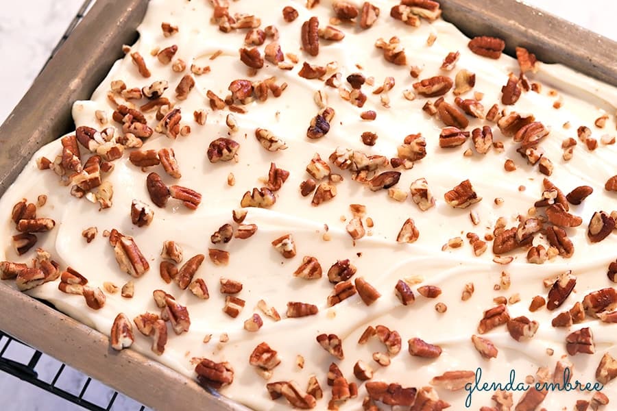 Sour Cream Spice Cake with Cream Cheese Frosting and Chopped Pecans