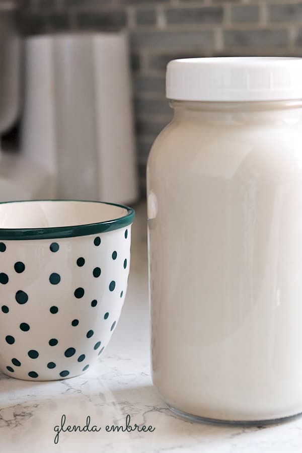 mason jar of Cashew Coconut Milk and a coffee mug - fabulous dairy alternative and non-dairy blend