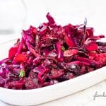 Ruby Coleslaw in a white serving dish