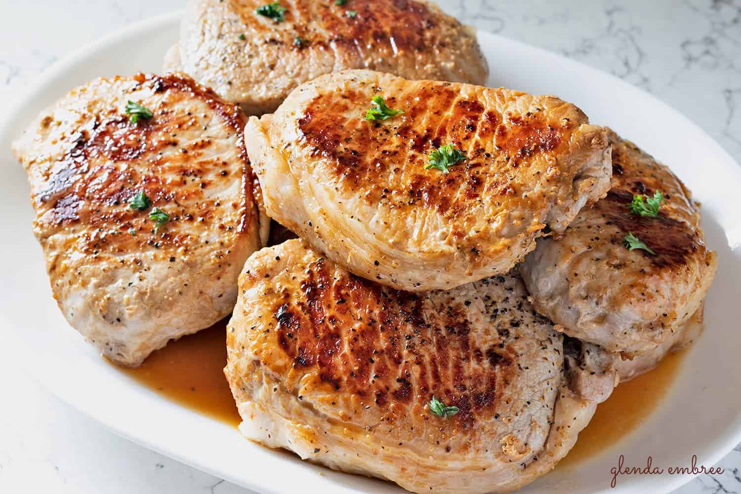 https://glendaembree.com/wp-content/uploads/2021/04/pan-seared-pork-chops-platter-1-h-b.jpg