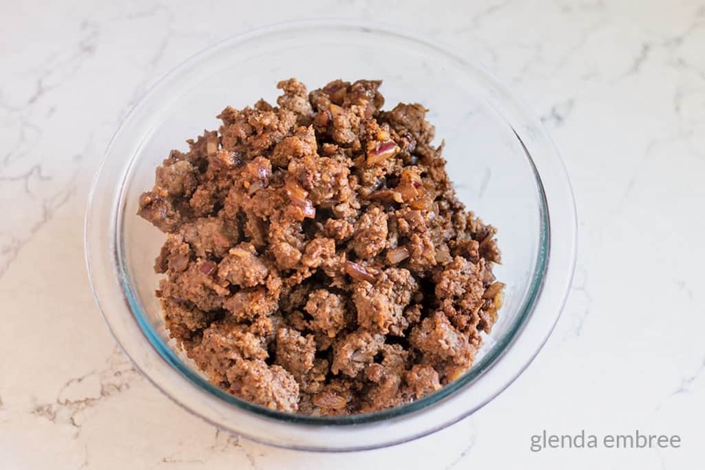 ground beef crumbles, browned and set aside in a glass bowl