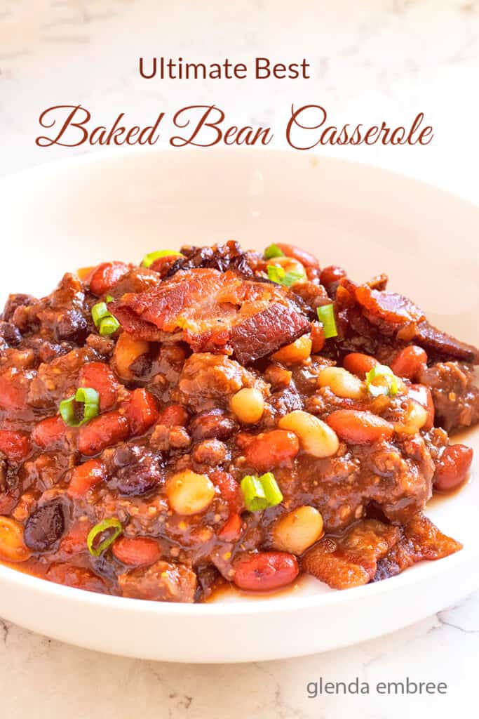 Baked Bean casserole in a white, low side ceramic bowl