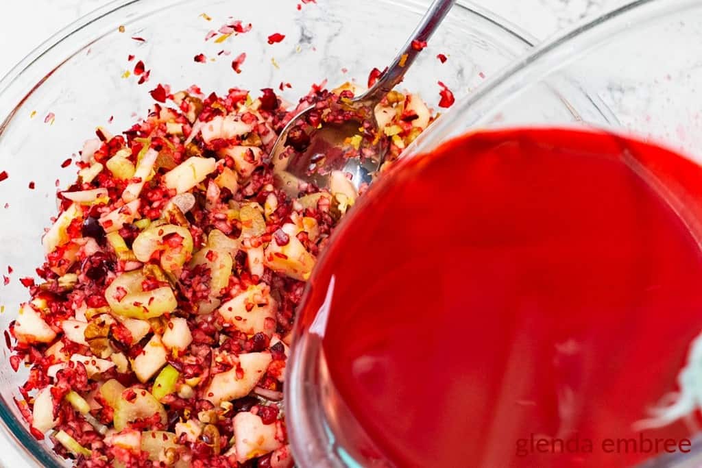 pouring gelatin into Cranberry Apple Salad