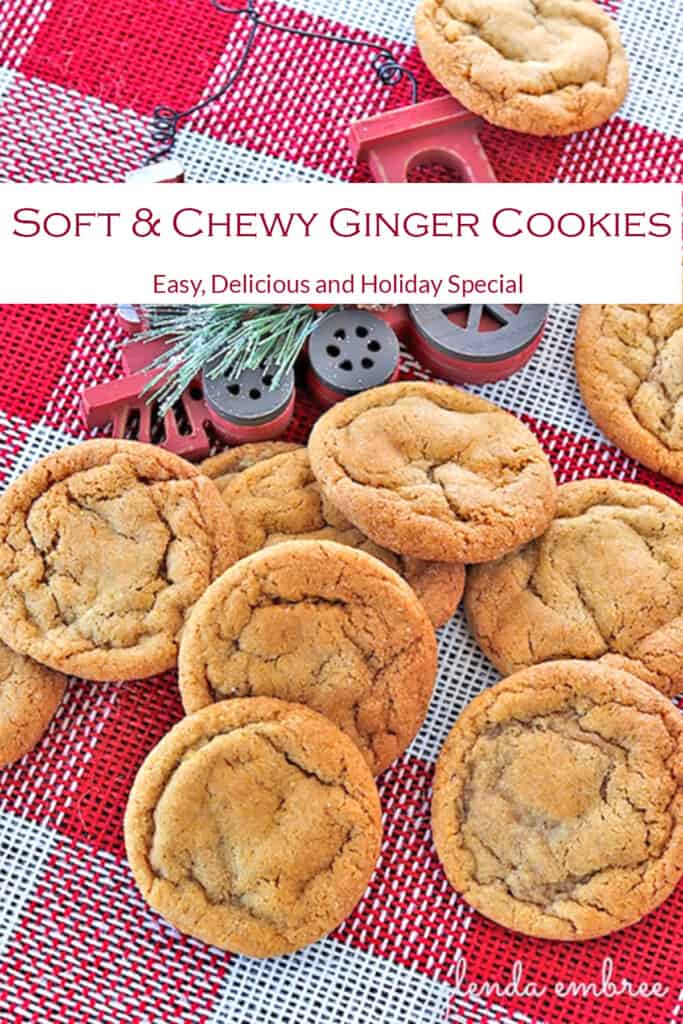 Soft Ginger Cookies on red and white checked cloth, next to a train Christmas ornament
