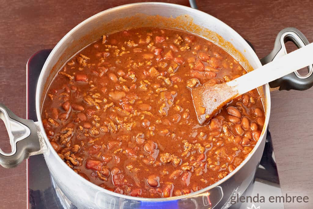 homemade chili in a pot, fully cooked