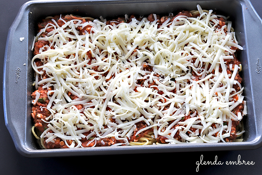 layers 1, 2 and 3 of baked spaghetti in a 9x13 pan