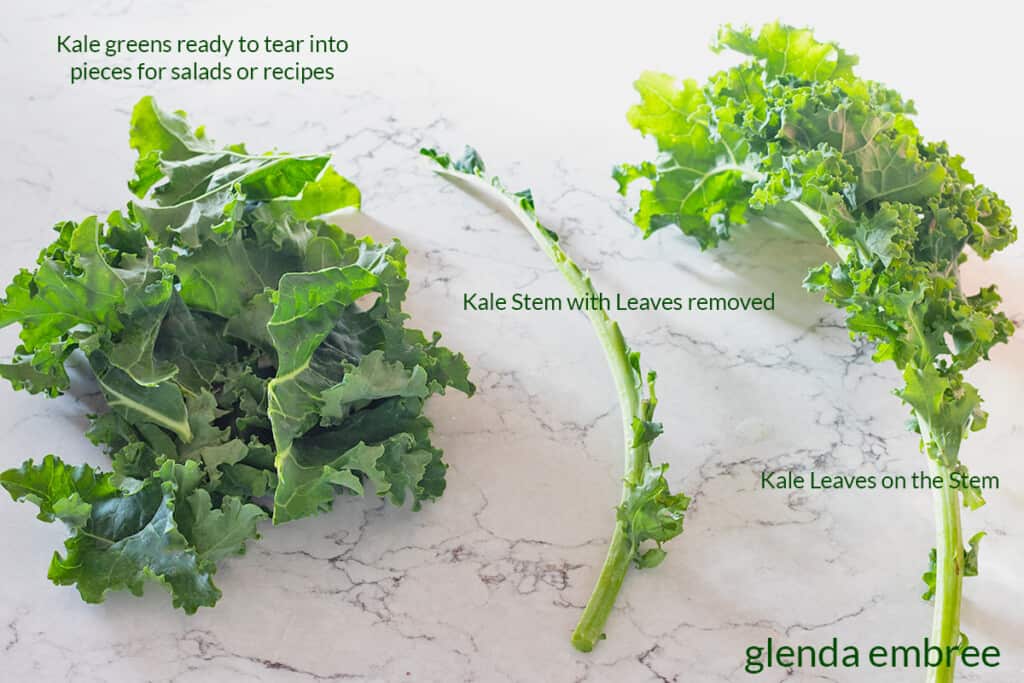 removing kale leaves from the stems
