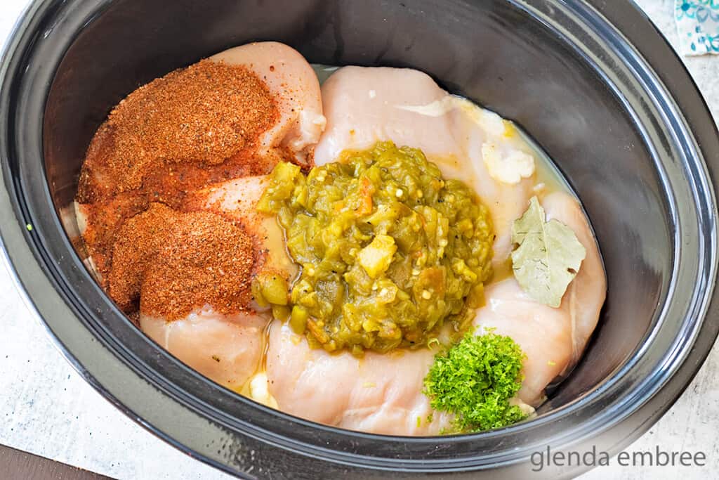 ingredients for slow cooker southwestern chicken in a slow cooker