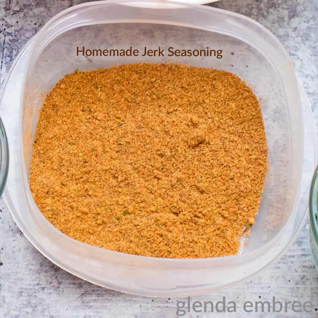 homemade jerk seasoning in a plastic storage container