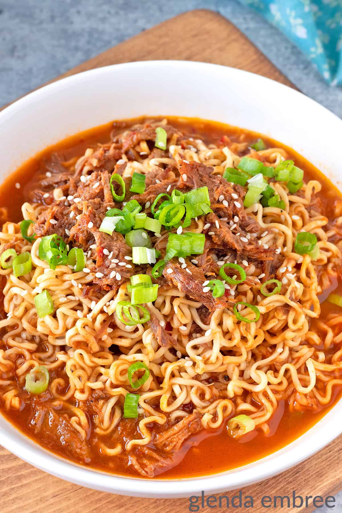 Ramen made with Mexican Shredded Beef broth and Mexican shredded beef.  Topped with sliced green onions and sesame seeds.