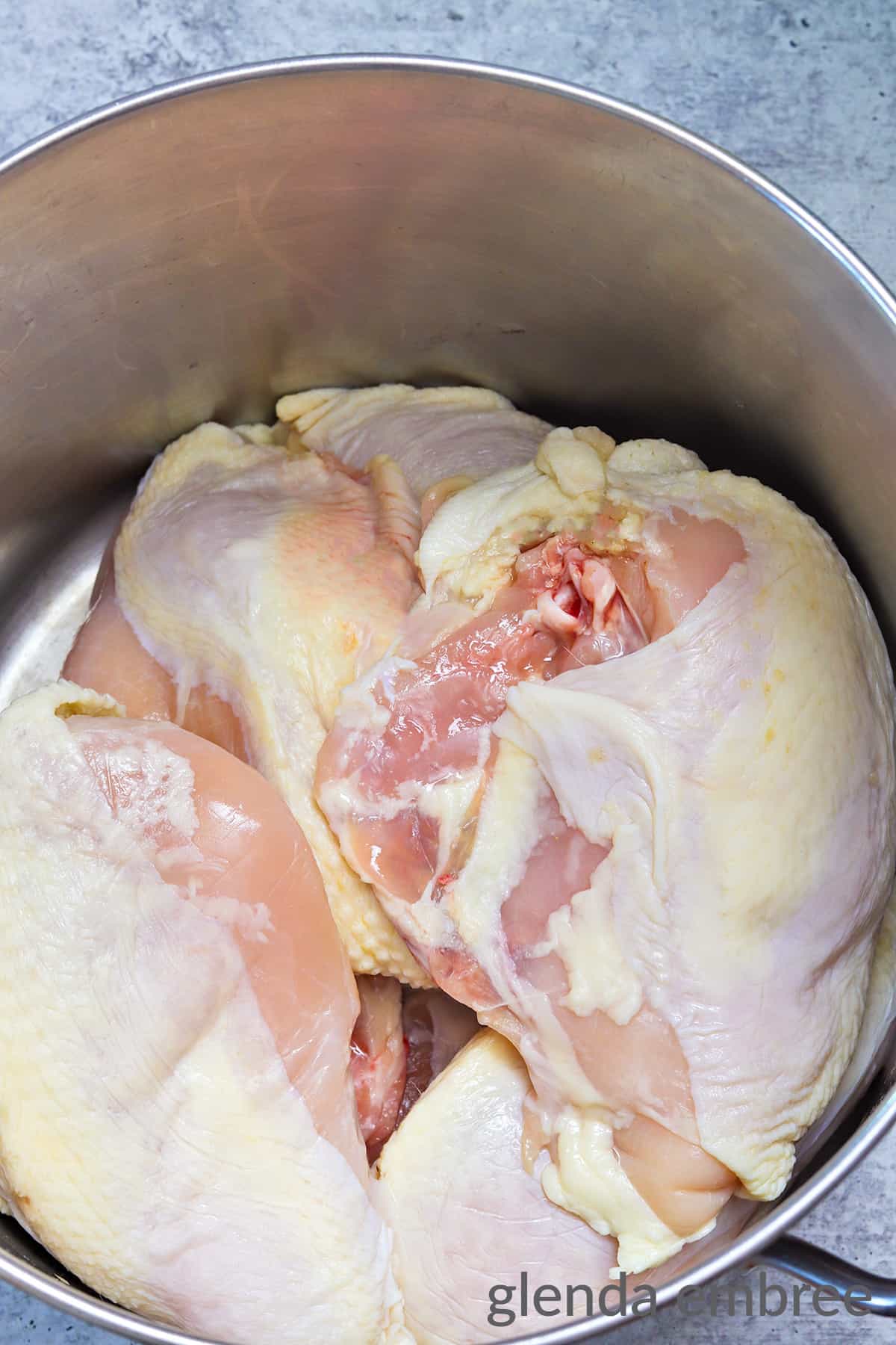 Making Chicken Stock - Chciken pieces in the bottom of a stock pot