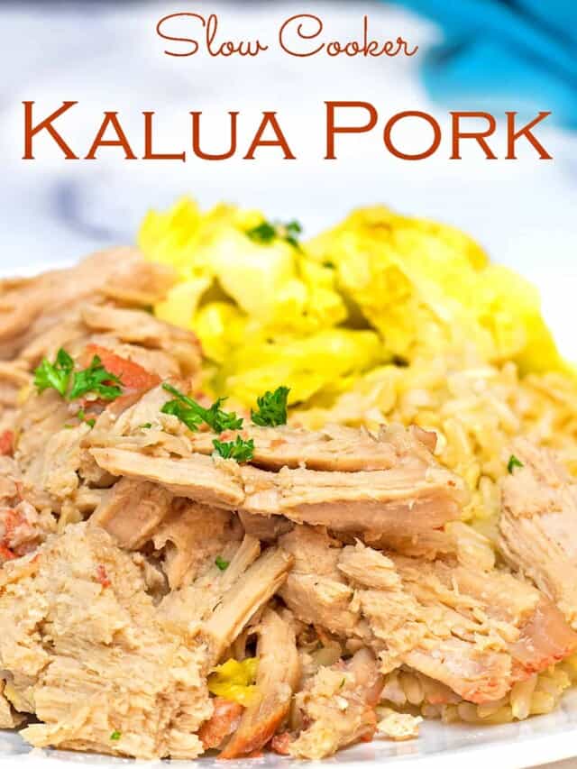 Kalua Pork on a white platter with steamed cabbage.