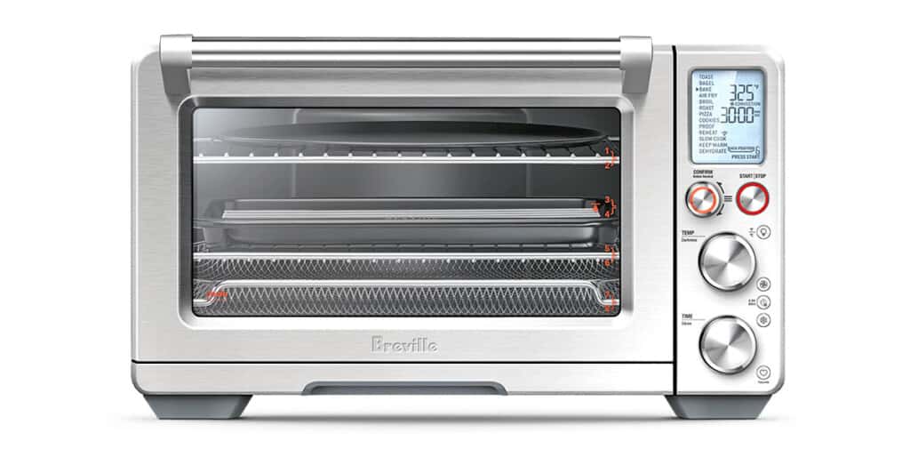 Breville Joule Oven Air Fryer Pro open showing racks and pans that come with it