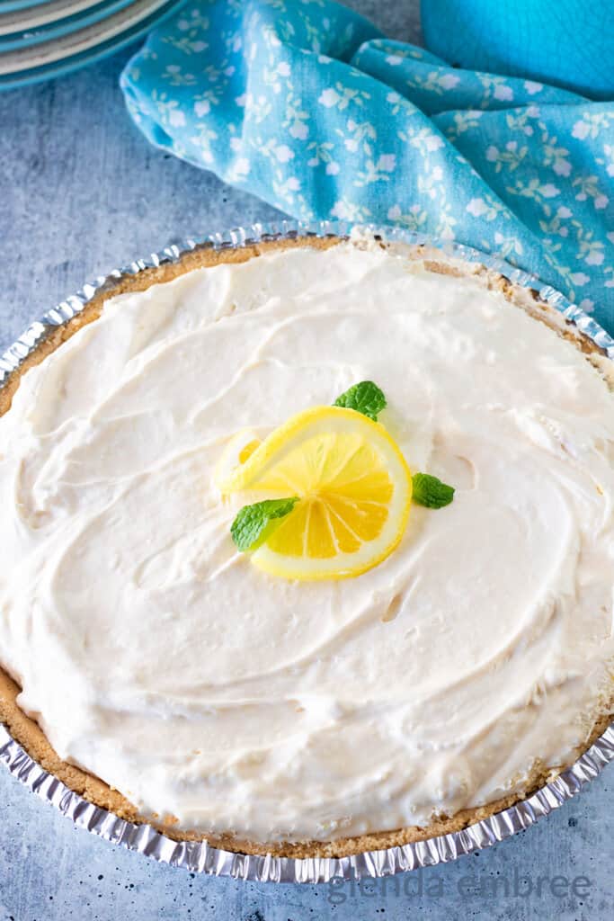 Whole Cream Cheese Lemonade Pie in a disposable pie plate.