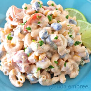 Mexican Macaroni Salad on a blue stoneware plate.