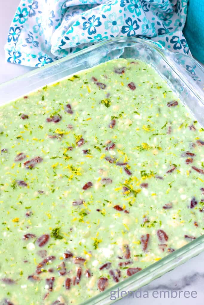 Lime Jello Salad with Cottage Cheese in a baking dish.