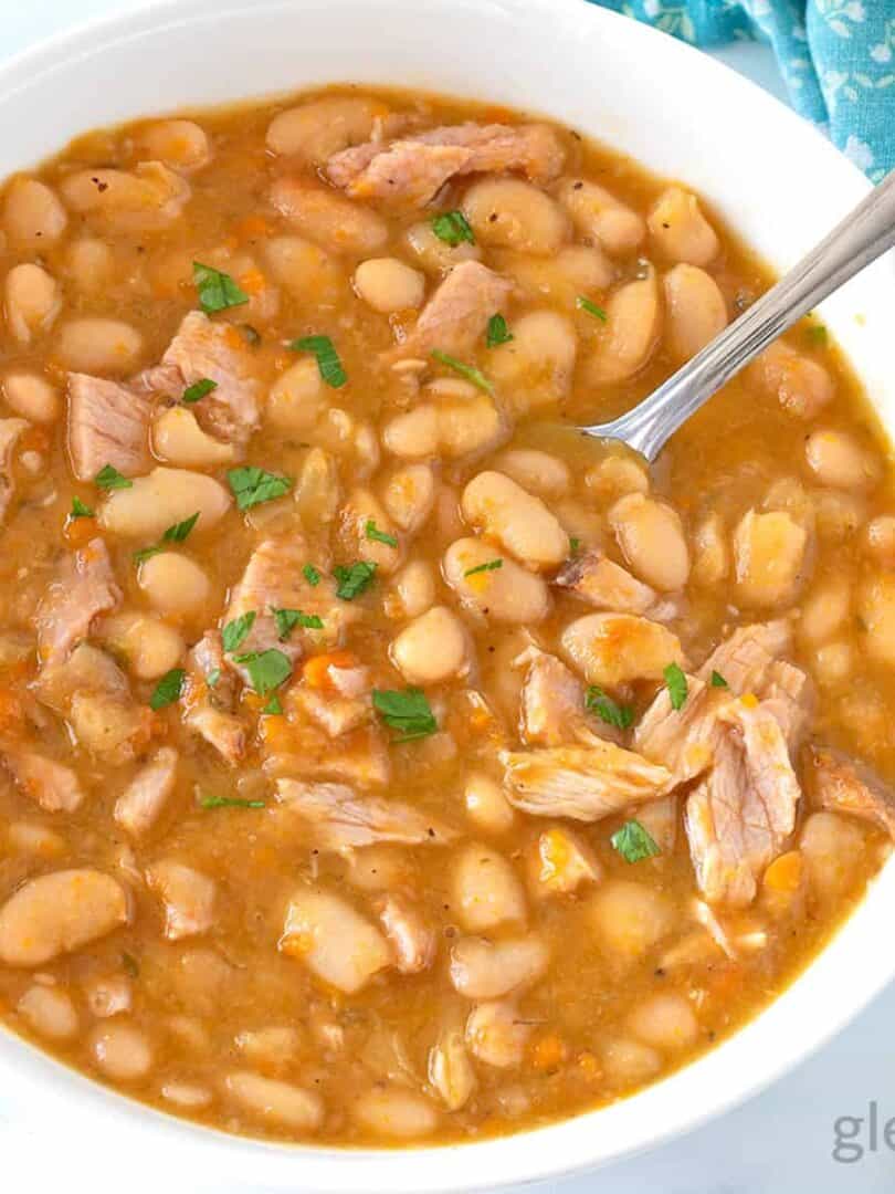 Ham and Beans Recipe served in a white bowl.