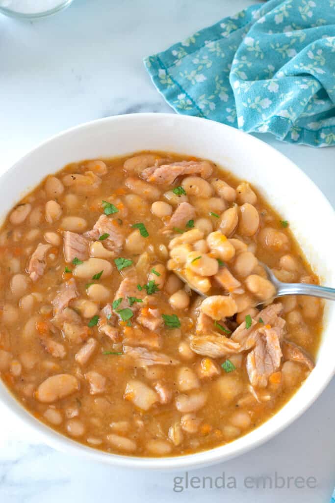 Ham and Bean Soup in a white bowl.