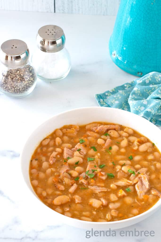 Ham and Beans in a white bowl.