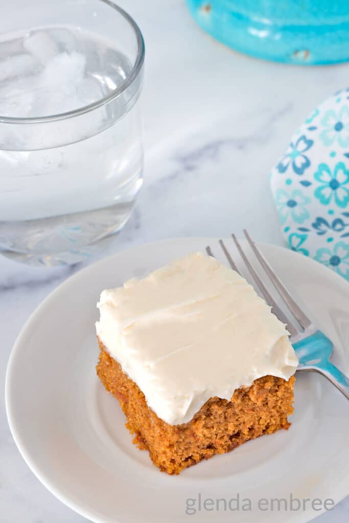 Pumpkin Bar on a white dessert plate with a fork.