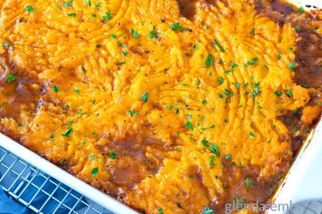 Baked Shepherd's Pie (Cottage Pie) with Mashed Butternut Squash in a white 9x13 baking dish.