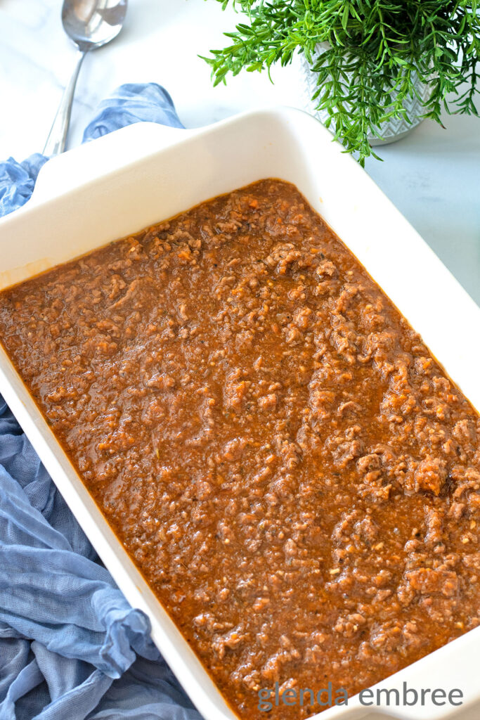 Cottage Pie Filling in a white ceramic baking dish.