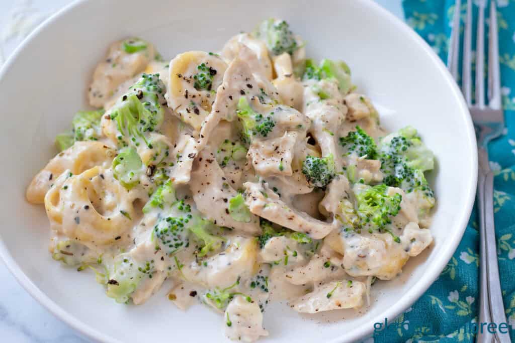 Chicken Tortellini in a white ceramic bowl.