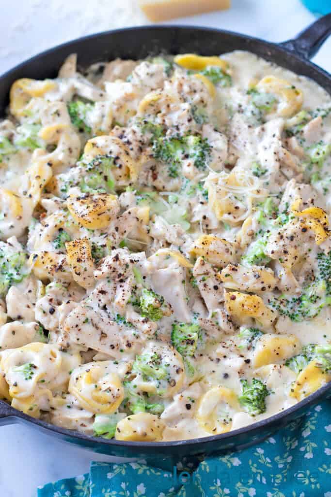 Chicken Tortellini in an enameled cast iron skillet.