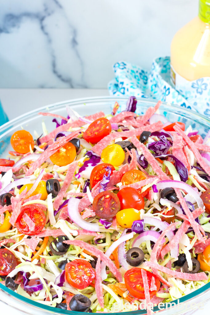 Italian Salad (Cabbage Salad) in a clear glass serving bowl.