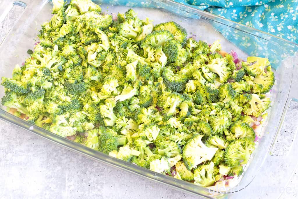 Broccoli Layer for Chicken Casserole in a glass 9x13 baking pan.