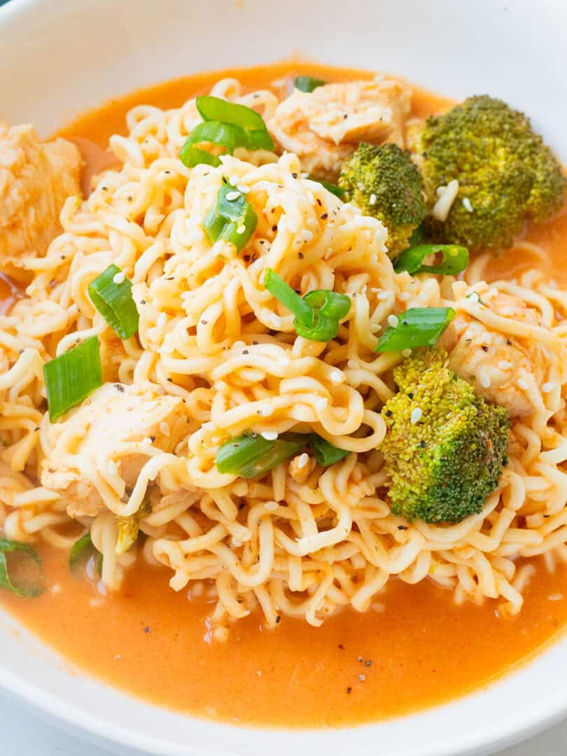 Spicy Chicken Ramen Noodles (Curry Ramen) in a white ceramic bowl.